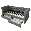 A gray upholstered daybed with two pull-out storage drawers. Anteprima dell’immagine prodotto