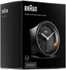 The image shows the packaging of a Braun radio-controlled alarm clock. Produktbild-Vorschau