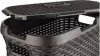 Close-up of the top of a brown laundry basket with its lid partially open. Produktbild-Vorschau