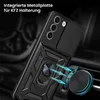 A black phone case with a ring holder is shown attached to a car vent via a magnetic mount. The phone case has a sliding camera cover and a rugged design. Produktbild-Vorschau