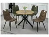 A dining table with four chairs in a room. Produktbild-Vorschau