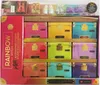 A product box containing multiple smaller boxes and accessories for dolls. Voir les images du produit