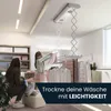 A mother and daughter are in a laundry room, using a ceiling-mounted electric clothes dryer. Produktbild-Vorschau