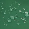 Close-up of water droplets on a green fabric surface. Anteprima dell’immagine prodotto