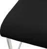A close-up view of a black chair seat and part of its legs. Produktbild-Vorschau