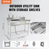 A stainless steel outdoor utility sink with storage shelves, shown with dimensions and close-up views of the sink basin. Náhled obrázku produktu