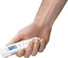 A hand holding a white digital thermometer. Produktbild-Vorschau