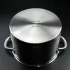The bottom of a stainless steel pot is shown against a black background. Náhľad obrázku produktu