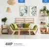 A split image showing a living room with a sofa and shelves, comparing two camera resolutions. Voir les images du produit