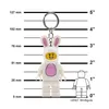 A LEGO minifigure keychain in a bunny costume is shown next to a ruler with both metric and imperial measurements. Podgląd zdjęcia produktu