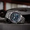 A close-up shot of a Citizen Promaster Sky watch with a blue dial, resting on a metal surface with some tools in the background. Produktbild-Vorschau