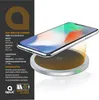 A smartphone is placed on a wireless charging pad, with an orange glow emanating from the pad to indicate charging. Produktbild-Vorschau