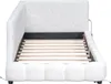 A white upholstered bed frame with a slatted base, shown from a slightly elevated angle. Náhled obrázku produktu