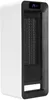 A white and black electric heater with a digital display. Voir les images du produit