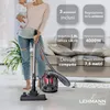 A woman holding a baby is using a vacuum cleaner in a living room. The image includes promotional text and feature highlights for the vacuum cleaner. Náhled obrázku produktu