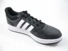 A black Adidas sneaker with white stripes on a white background. Produktbild-Vorschau
