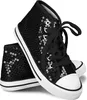 A pair of black sequined high-top sneakers. Produktbild-Vorschau
