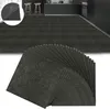 A kitchen or dining area with dark gray flooring, two bar stools, and a kitchen counter. Náhled obrázku produktu