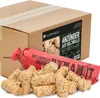 A cardboard box with a label and a red package of fire starters, with some fire starters scattered in front. Produktbild-Vorschau