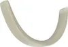 A close-up studio shot of a white headphone headband cushion. Voir les images du produit