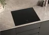 A black induction hob is shown on a marble countertop. Náhľad obrázku produktu