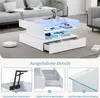 A white high-gloss coffee table with LED lighting and storage, shown in a living room setting with a sofa and a robot vacuum cleaner. Produktbild-Vorschau