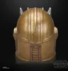 A close-up, studio shot of a golden helmet against a black background. Anteprima dell’immagine prodotto