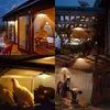 A collage of four images showing solar pendant lights used in various outdoor and indoor settings, including a patio, a pergola, a chicken coop, and a stable. Anteprima dell’immagine prodotto