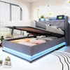 A bedroom setting with a bed that has its storage compartment open. Produktbild-Vorschau