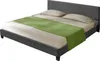 A bed with a gray fabric frame and headboard, dressed with beige sheets and two pillows, and a green runner across the foot of the bed. Produktbild-Vorschau