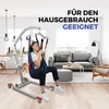 A woman is using a patient lift in a living room. Produktbild-Vorschau
