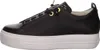Side view of a black leather sneaker with a white platform sole. Voir les images du produit