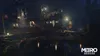 A dark, atmospheric scene featuring a dilapidated ship at night, illuminated by lanterns. The water reflects the lights, creating a moody ambiance. The 'Metro Exodus' logo is visible in the bottom right corner. Produktbild-Vorschau
