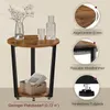 A round side table with two shelves, displayed with decorative items and informational callouts. Produktbild-Vorschau