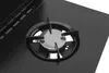 A close-up view of a gas burner on a black stovetop. Produktbild-Vorschau