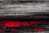 A close-up, abstract view of a rug with a distressed, textured pattern in black, gray, red, and white. Anteprima dell’immagine prodotto