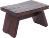 A dark brown wooden stool is shown against a white background. Produktbild-Vorschau