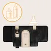 A product shot of a bottle warmer with illustrative graphics of bottles above it. Produktbild-Vorschau