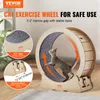 A cat is running on a wooden exercise wheel indoors. Náhľad obrázku produktu