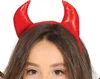 Close-up of a person's head wearing devil horns. Podgląd zdjęcia produktu