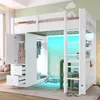 A child's loft bed with integrated storage, wardrobe, and desk, set up in a bedroom with decorative elements. Produktbild-Vorschau