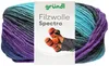 A ball of yarn with a label showing socks and pom-poms. Produktbild-Vorschau