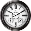 A close-up view of a large, round wall clock with Roman numerals, a thermometer, and a hygrometer. Produktbild-Vorschau