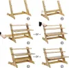 Collage of images showing the assembly and adjustment of a bamboo standing desk. Produktbild-Vorschau