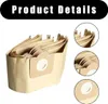 A stack of brown paper vacuum cleaner bags. Produktbild-Vorschau