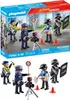 A Playmobil police action heroes playset is shown in its packaging, with figures and accessories arranged on a street scene. Produktbild-Vorschau