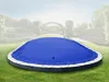 A blue pool cover is shown on a trampoline in a garden setting. Produktbild-Vorschau