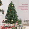 A decorated Christmas tree surrounded by wrapped gifts. Produktbild-Vorschau