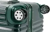 Close-up view of the wheels and corner of a green suitcase. Náhľad obrázku produktu