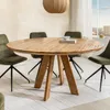 A round wooden dining table with four green chairs in a dining room setting. Produktbild-Vorschau